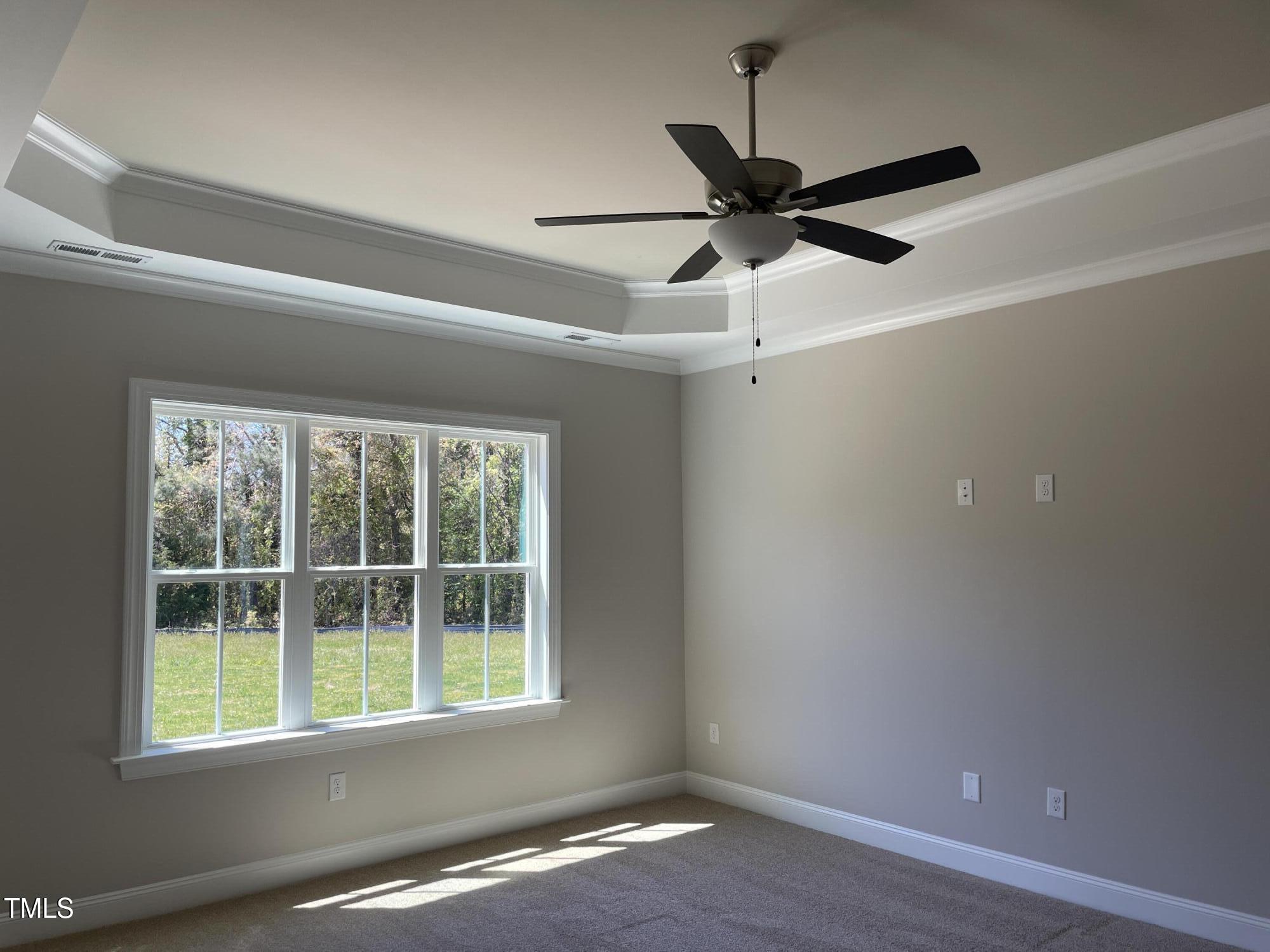 85 Old Gdn Lane Youngsville, NC 27596 - Photo 10 of 17 a view of an empty room with a window