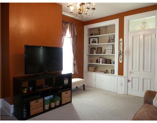 965 Tuscarawas Road Beaver, PA 15009 - Photo 8 of 18 Family Room. Main floor family room is so attractive and convenient. Original built-in shelving adds to the classic decor. Door shown here leads to 1/2 Bath and Laundry area. Stackable, front loading washer,dryer included!