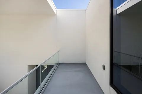 a view of pool with patio