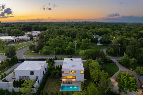 an aerial view of a house with a garden
