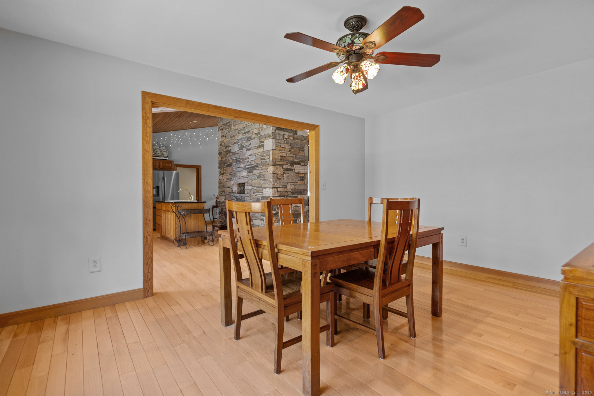 679 Bailey Hill Road Killingly, CT 06241 - Photo 14 of 39 a view of a dining room with furniture window and wooden floor