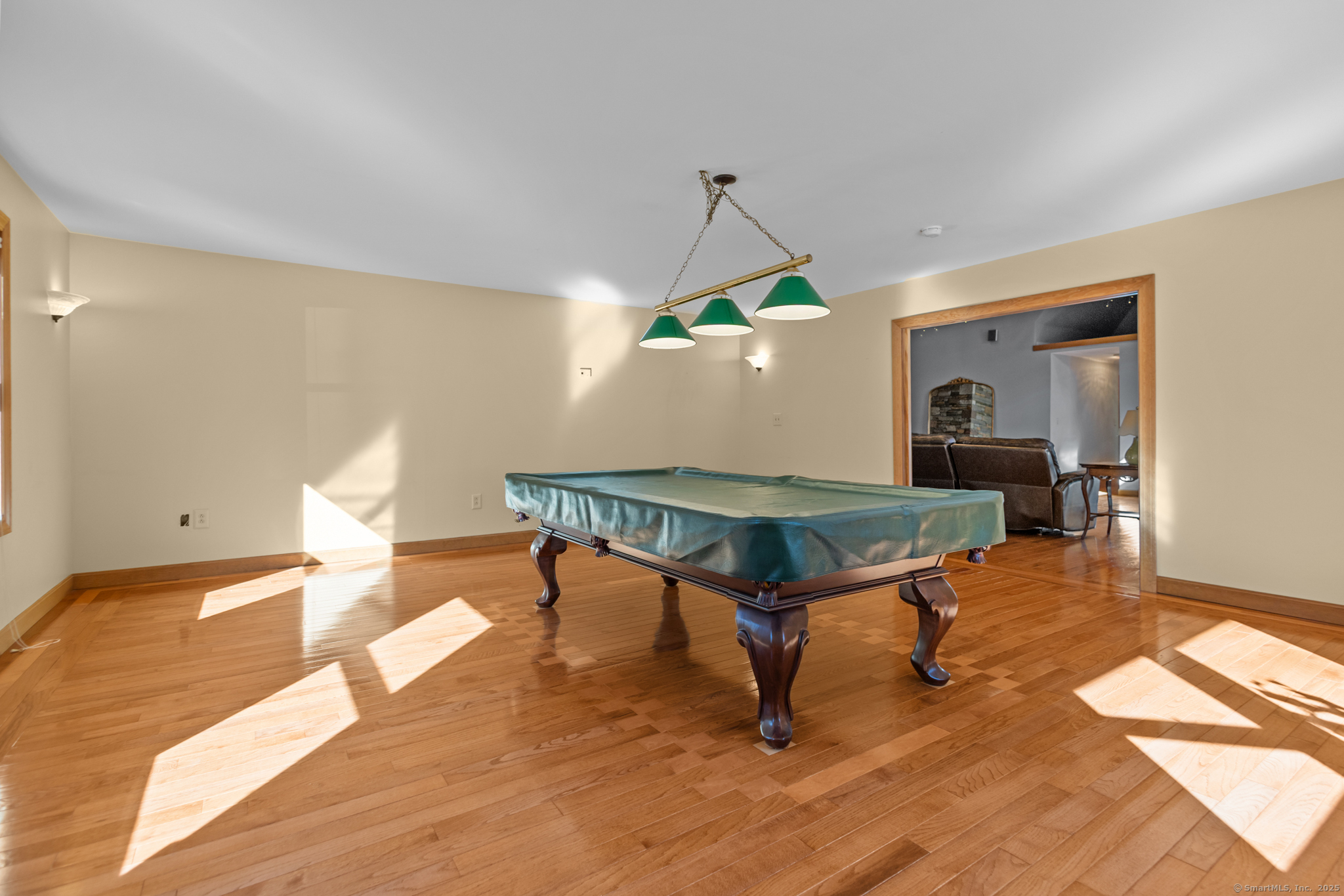 679 Bailey Hill Road Killingly, CT 06241 - Photo 21 of 39 a living room with furniture a table and a potted plant