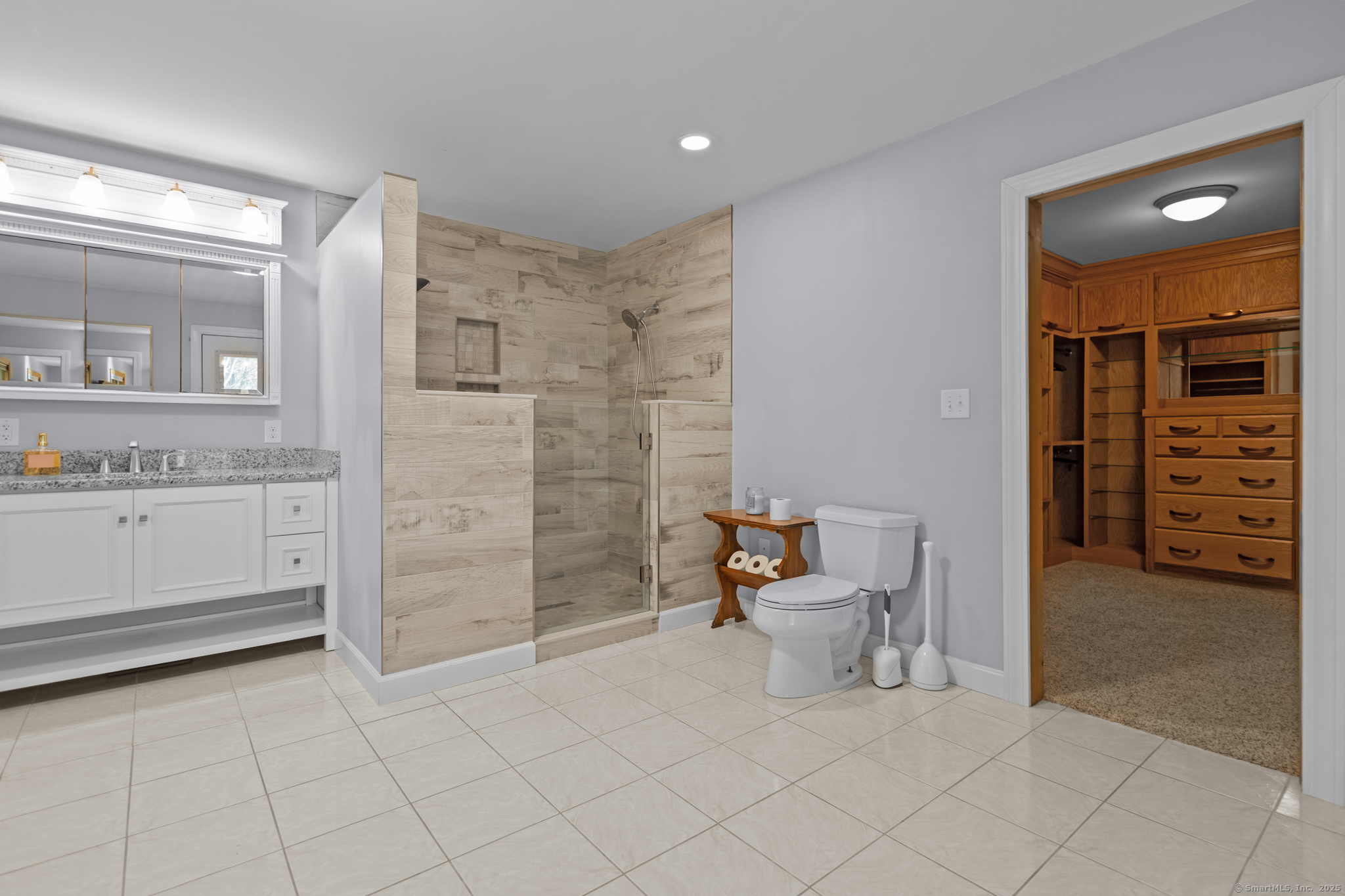 679 Bailey Hill Road Killingly, CT 06241 - Photo 29 of 39 a bathroom with a sink and a mirror