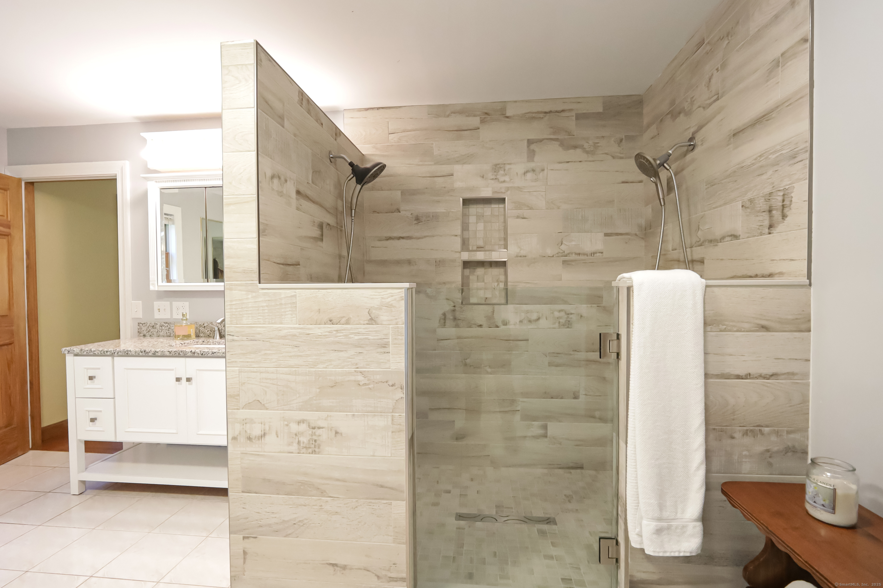 679 Bailey Hill Road Killingly, CT 06241 - Photo 31 of 39 a bathroom with a bathtub sink and mirror