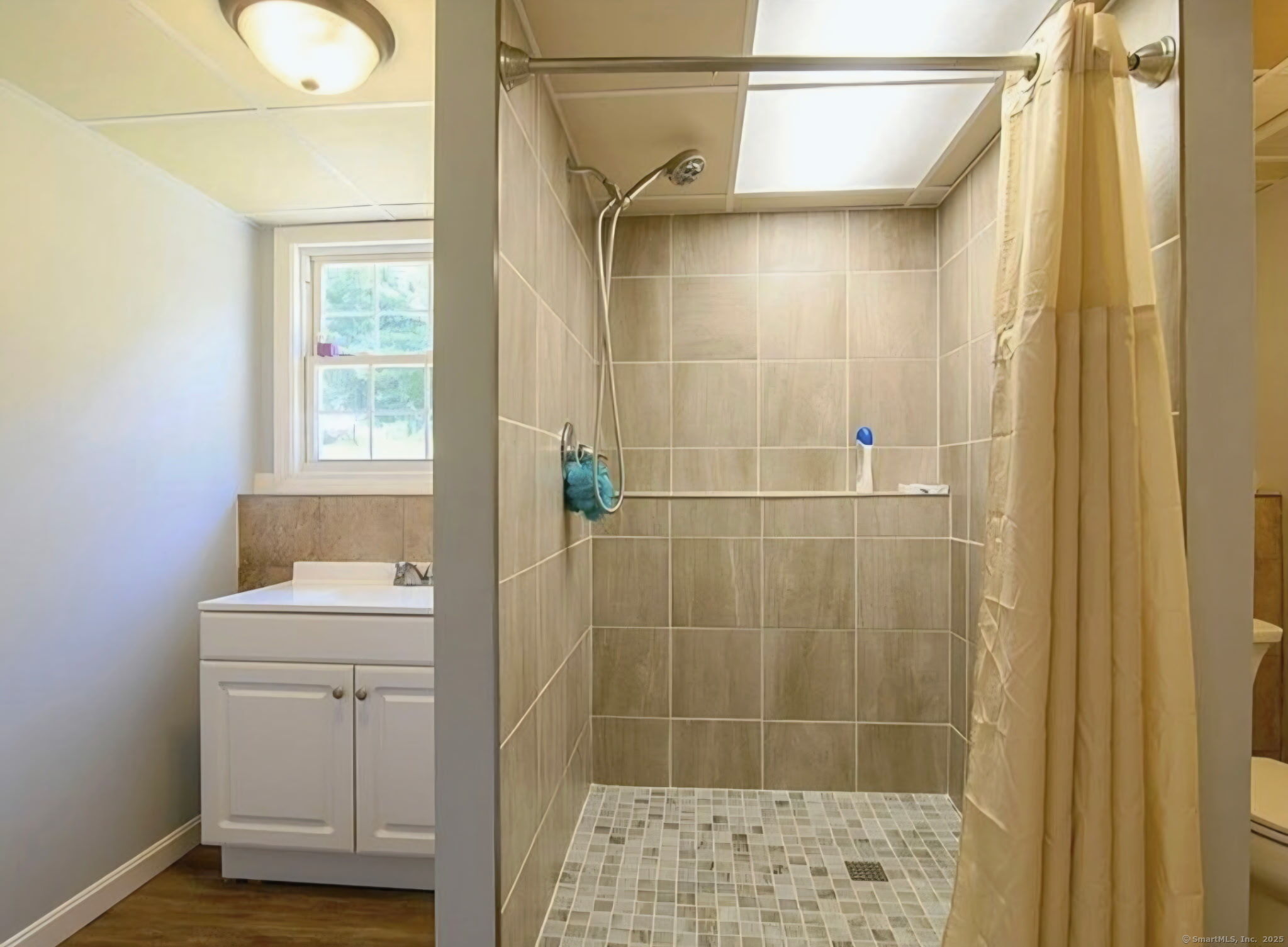 679 Bailey Hill Road Killingly, CT 06241 - Photo 33 of 39 a bathroom with a sink toilet and shower