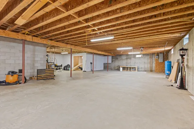 a view of swimming pool with an outdoor seating