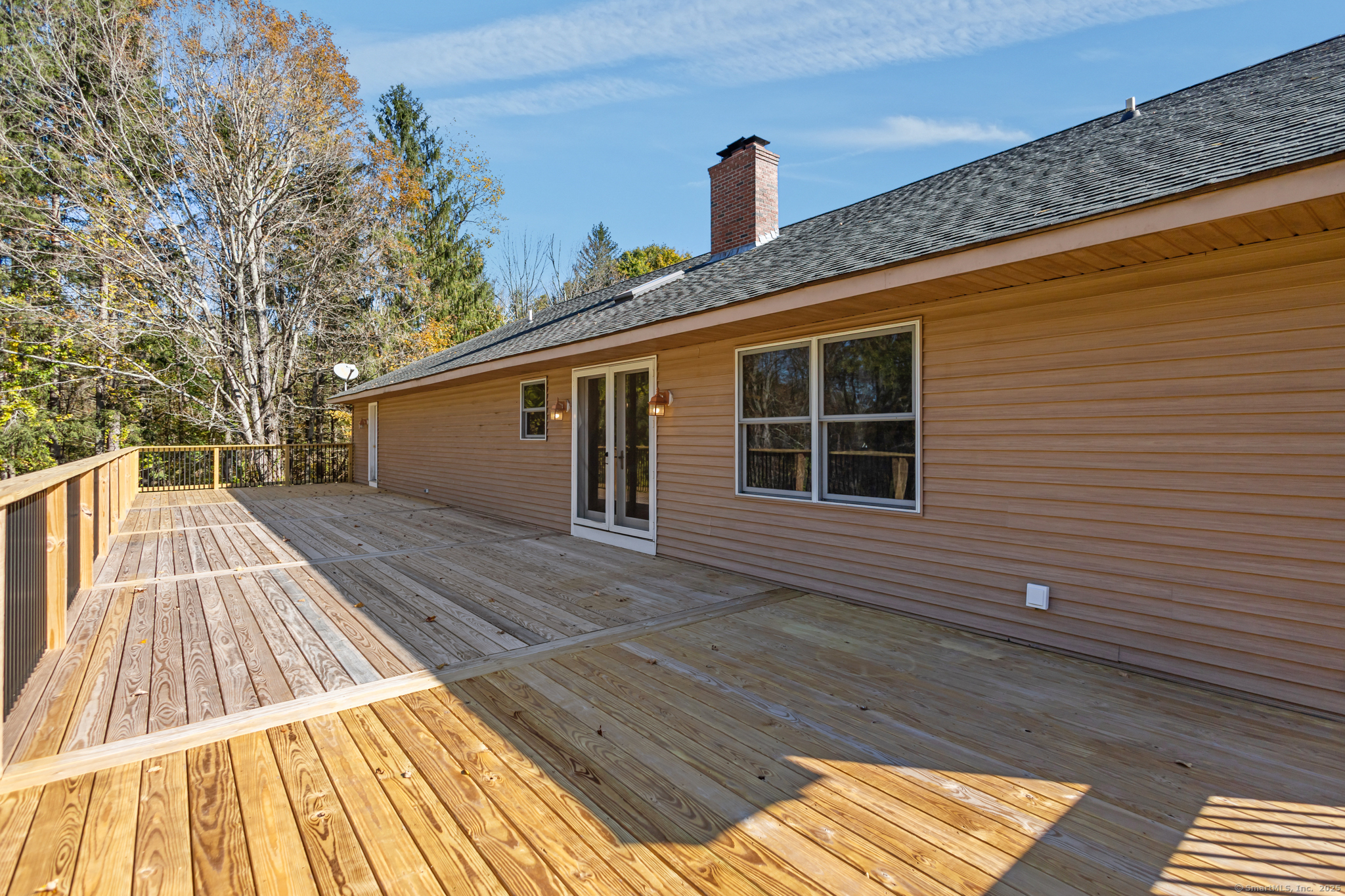 679 Bailey Hill Road Killingly, CT 06241 - Photo 38 of 39 a view of a house with a roof deck