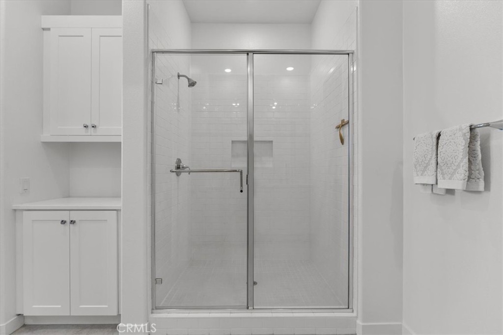 27410 Merlin Place, Unit 305 Valencia, CA 91381 - Photo 12 of 32 a bathroom with a shower