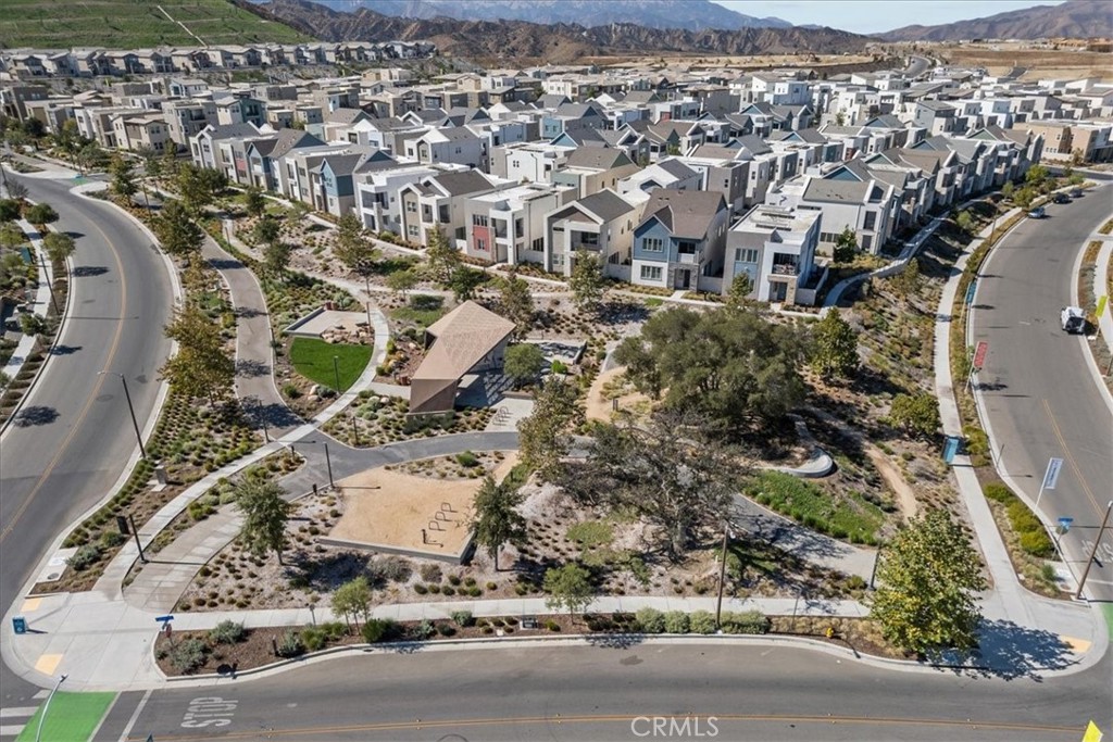 27410 Merlin Place, Unit 305 Valencia, CA 91381 - Photo 25 of 32 an aerial view of residential houses with outdoor space