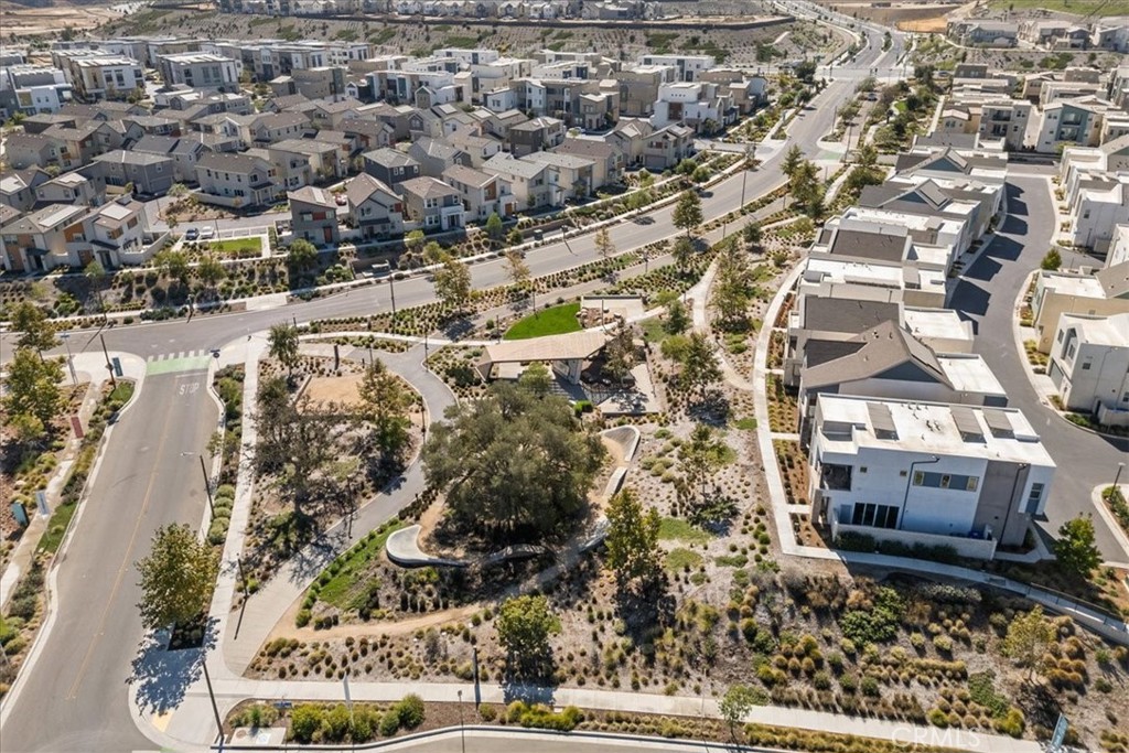 27410 Merlin Place, Unit 305 Valencia, CA 91381 - Photo 26 of 32 an aerial view of residential houses with yard
