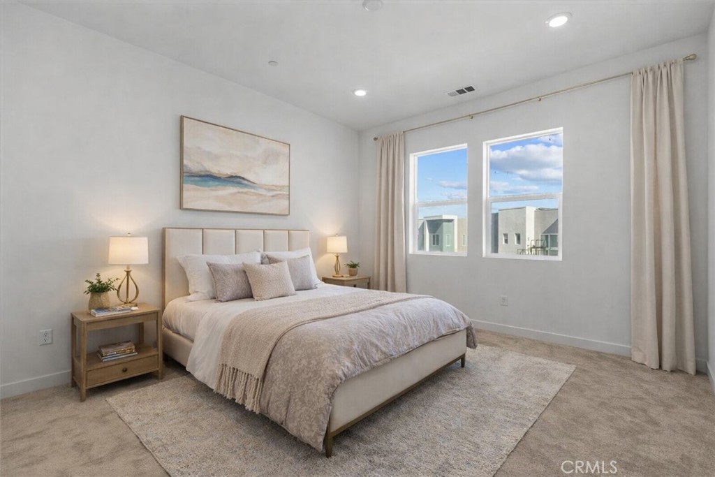 27410 Merlin Place, Unit 305 Valencia, CA 91381 - Photo 7 of 32 a bedroom with a bed and a window