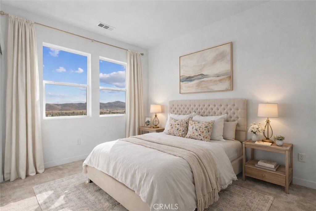 27410 Merlin Place, Unit 305 Valencia, CA 91381 - Photo 10 of 32 a bedroom with a bed and a window