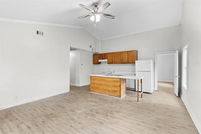 a bedroom with furniture and window
