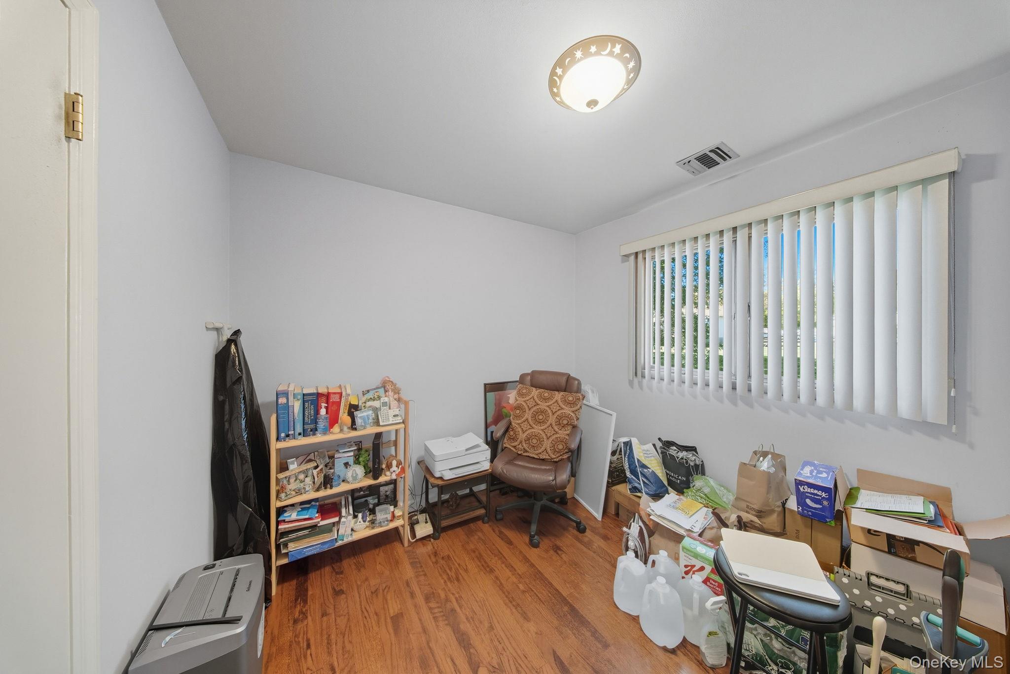 58 James Road Monroe, NY 10950 - Photo 15 of 24 a living room with furniture and a wooden floor