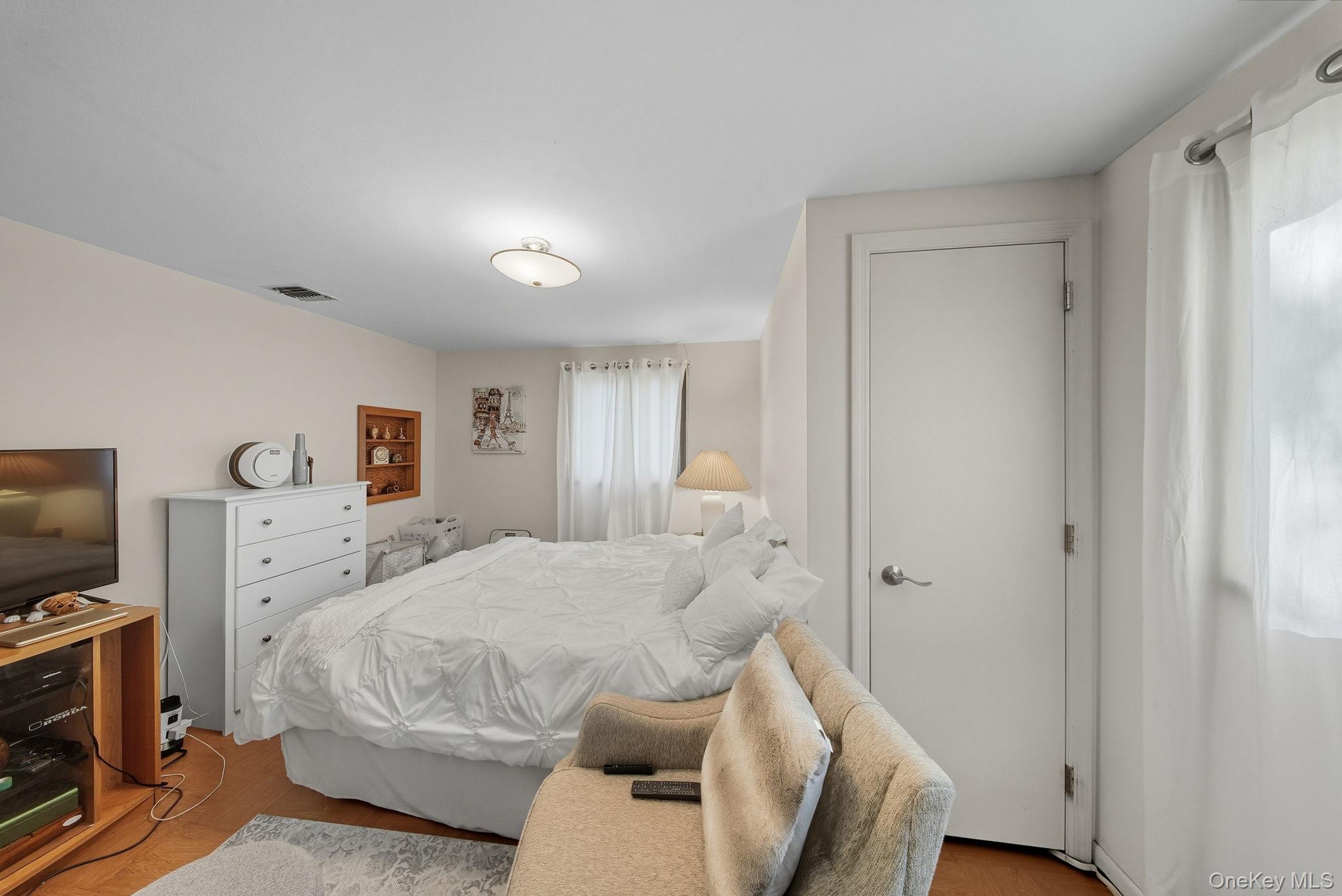 58 James Road Monroe, NY 10950 - Photo 16 of 24 a bedroom with a bed and a tv