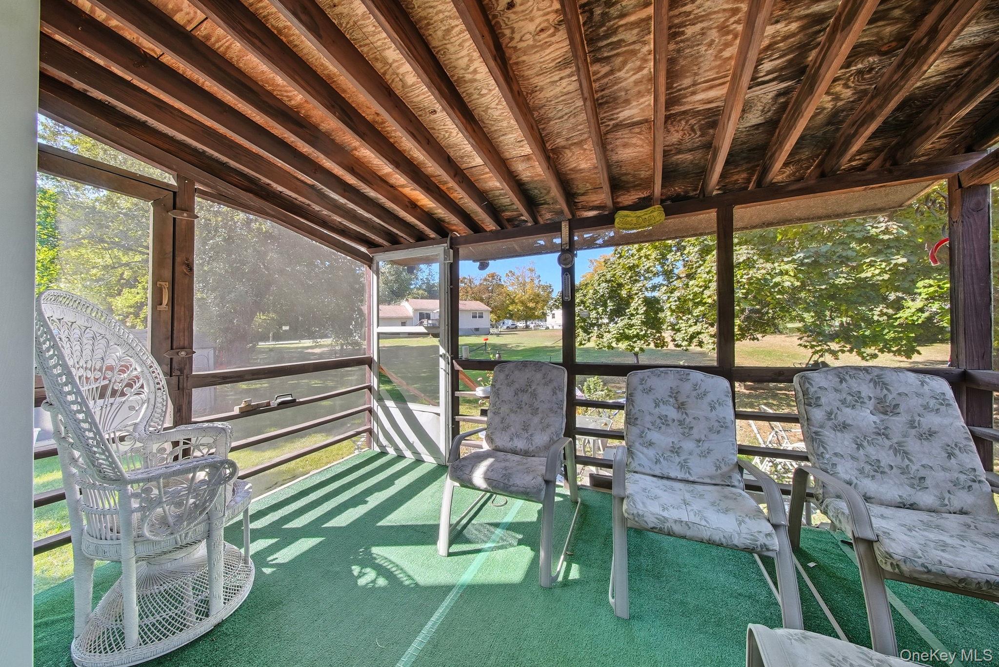 58 James Road Monroe, NY 10950 - Photo 21 of 24 a patio with a table chairs and a barbeque