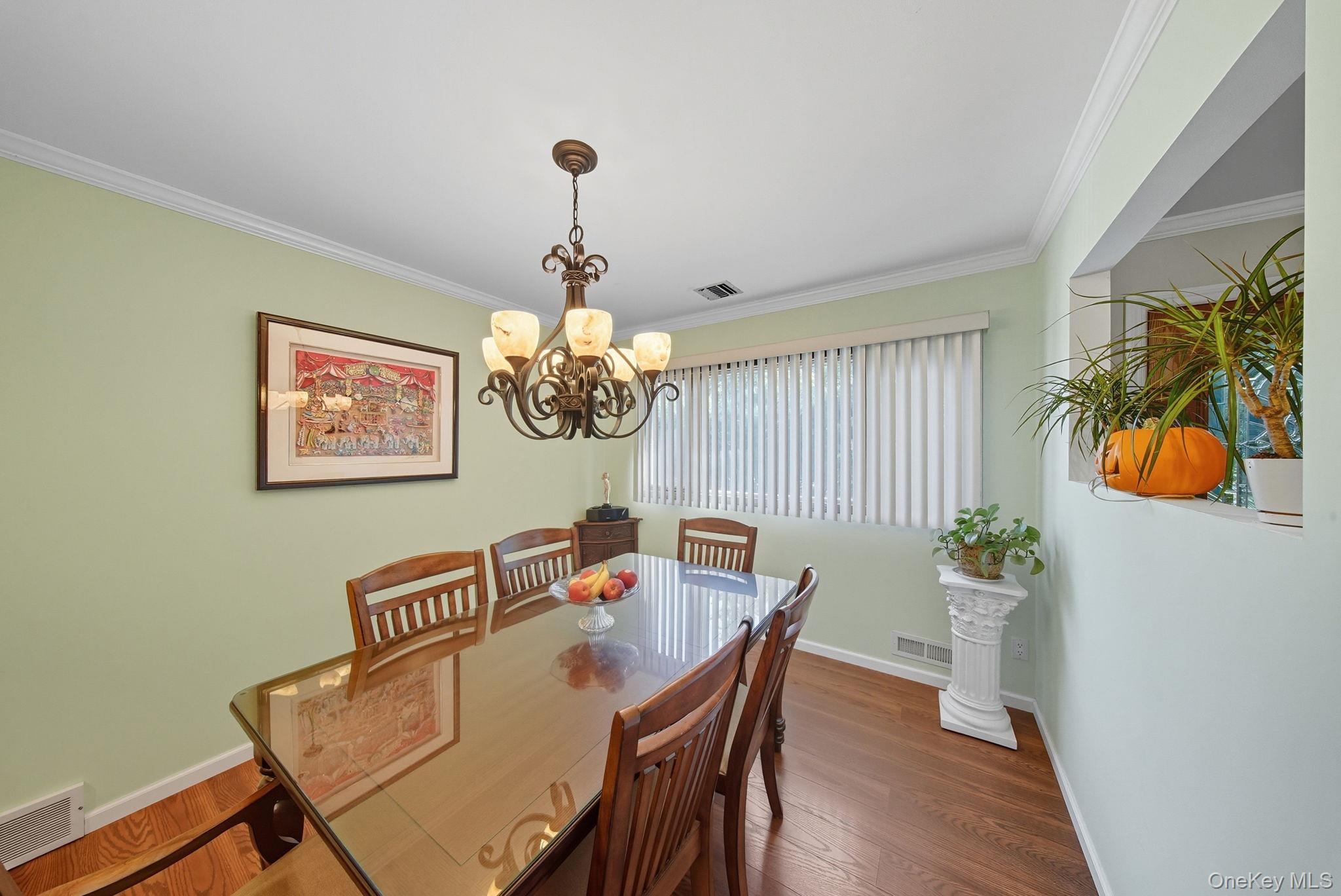 58 James Road Monroe, NY 10950 - Photo 5 of 24 a view of a dining room with furniture and wooden floor