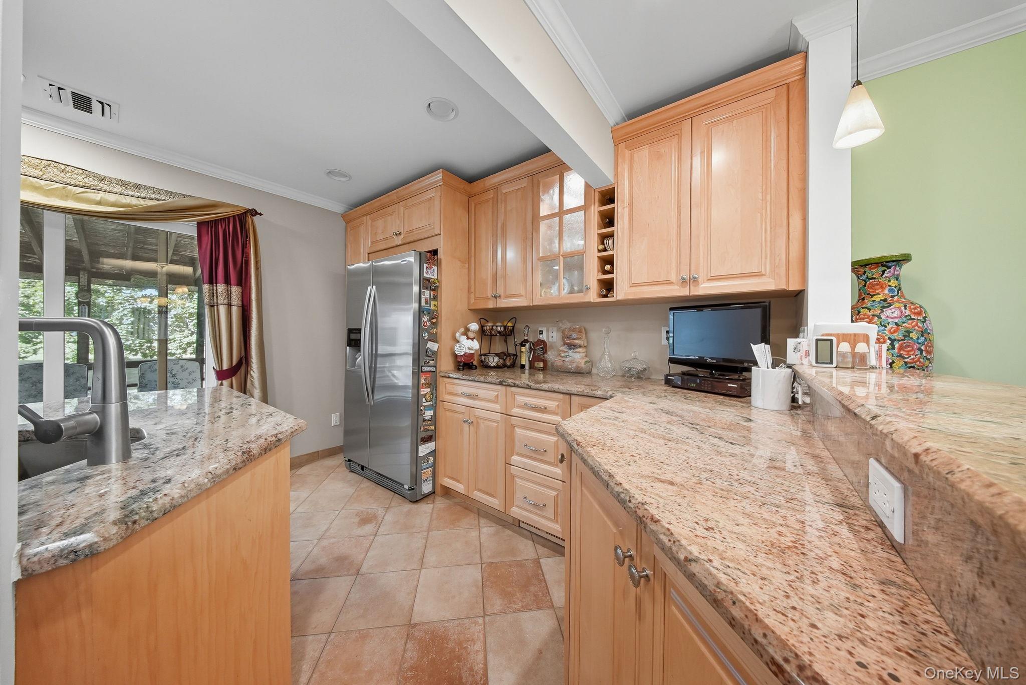 58 James Road Monroe, NY 10950 - Photo 8 of 24 a kitchen with stainless steel appliances granite countertop a sink stove and refrigerator