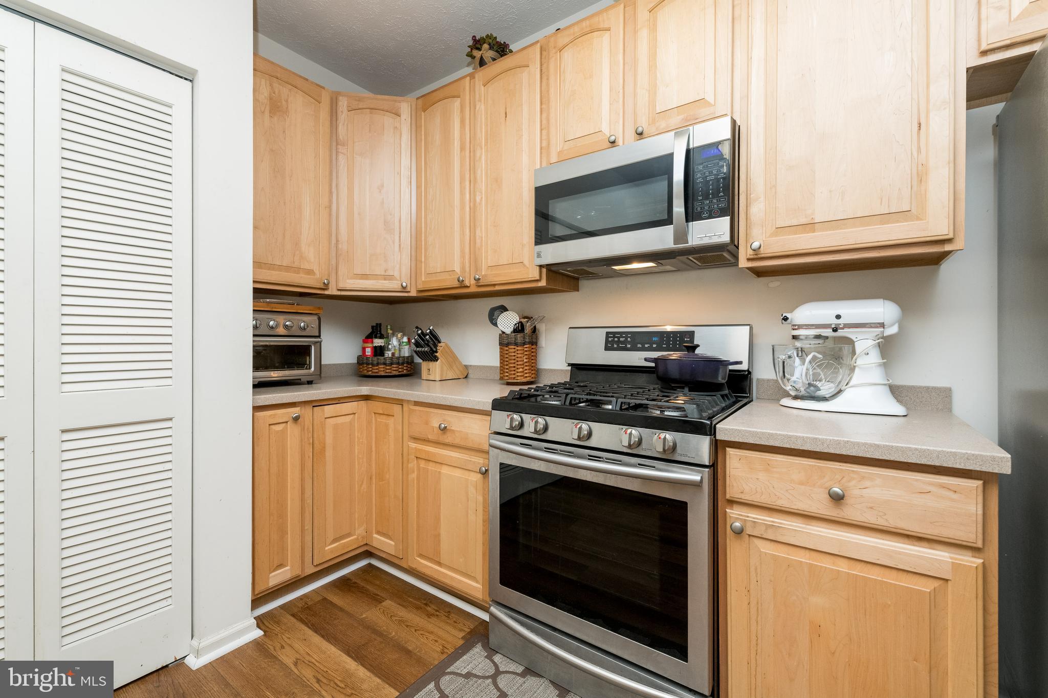 5436 Glenthorne Court, Unit 5436 Rosedale, MD 21237 - Photo 11 of 27 Updated flooring in kitchen, stainless appliances