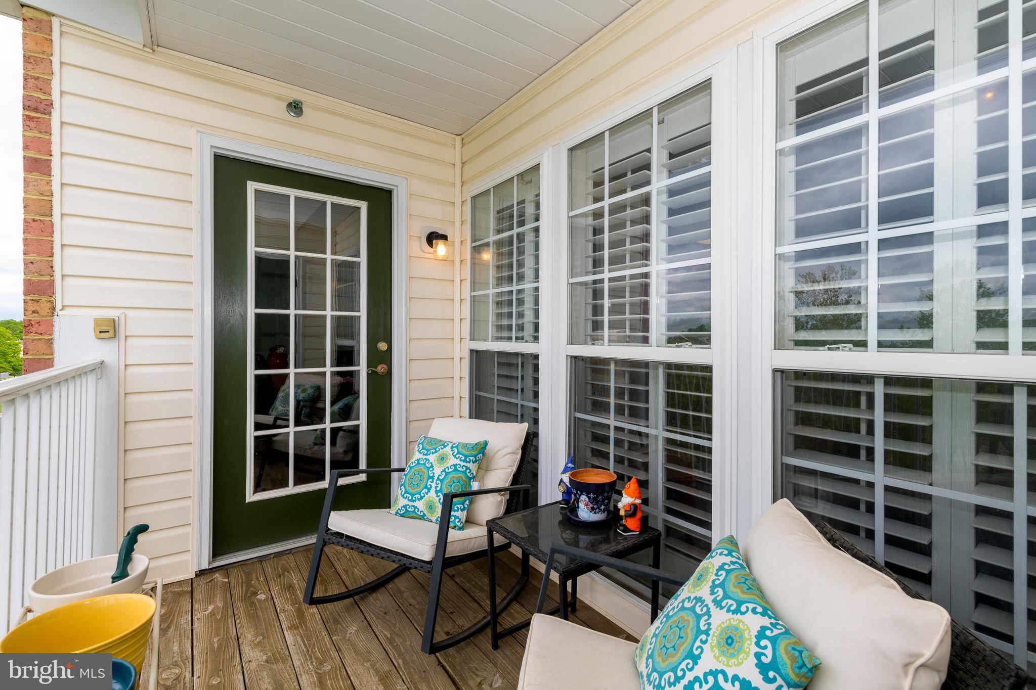 5436 Glenthorne Court, Unit 5436 Rosedale, MD 21237 - Photo 24 of 27 Balcony with plenty of room for chairs, table