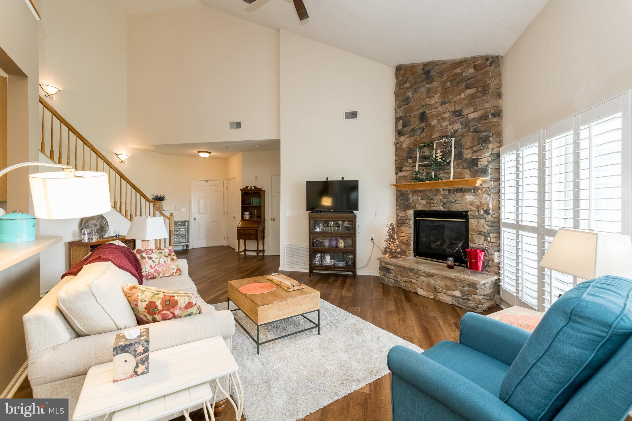 5436 Glenthorne Court, Unit 5436 Rosedale, MD 21237 - Photo 5 of 27 Light-filled living room with fire place