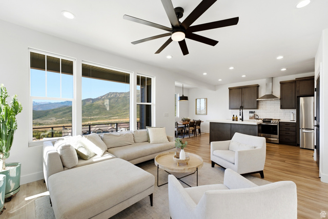 6039 North Westridge Road Heber City, UT 84032 - Photo 5 of 71 Open-concept living area with wood-finish flooring, recessed lighting, and a contemporary ceiling fan