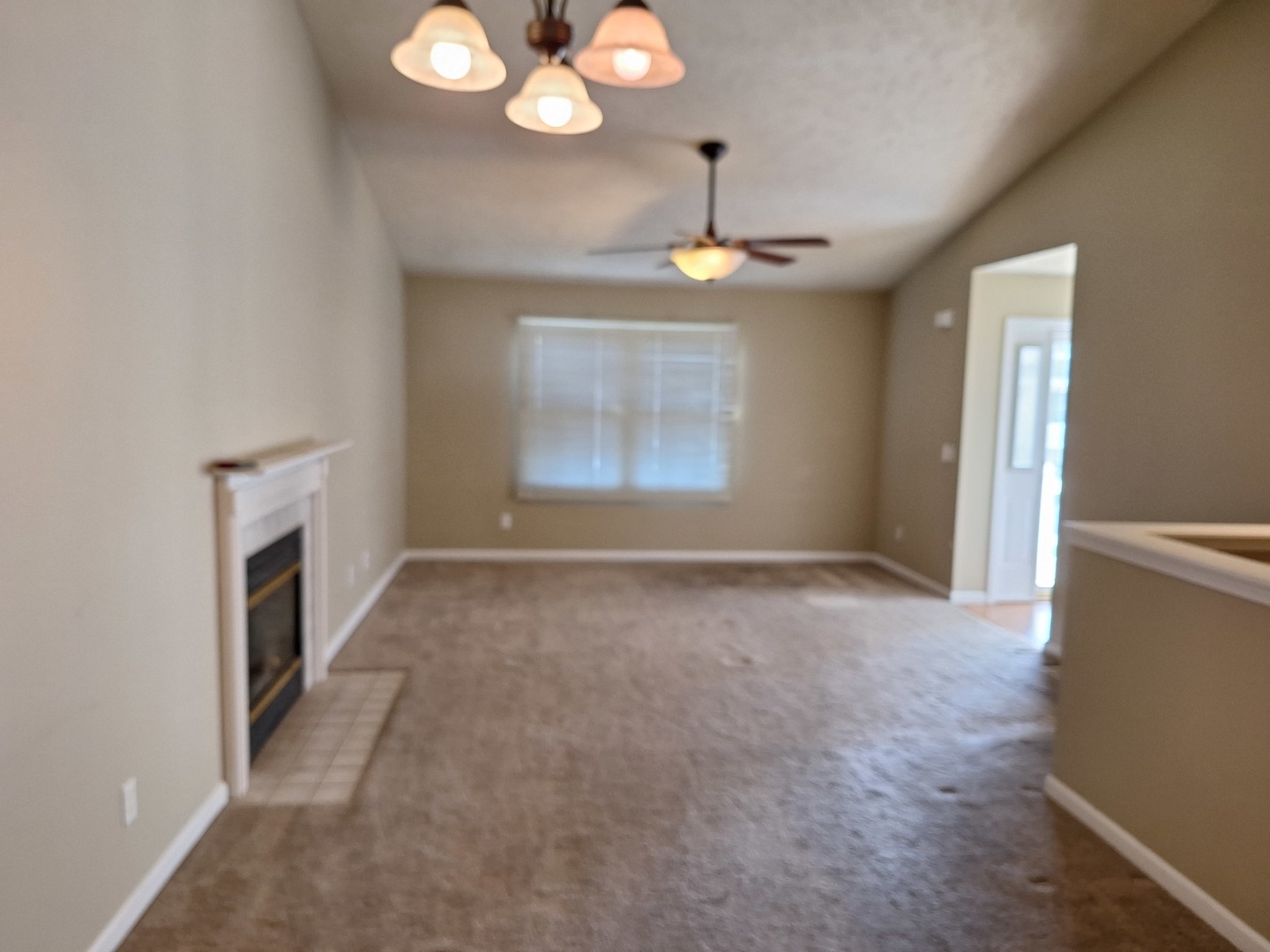 1104 Whitaker Street Normal, IL 61761 - Photo 5 of 19 wooden floor in an empty room with a window