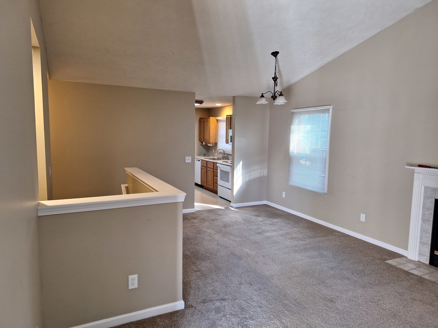 1104 Whitaker Street Normal, IL 61761 - Photo 6 of 19 an empty room with windows and cabinet