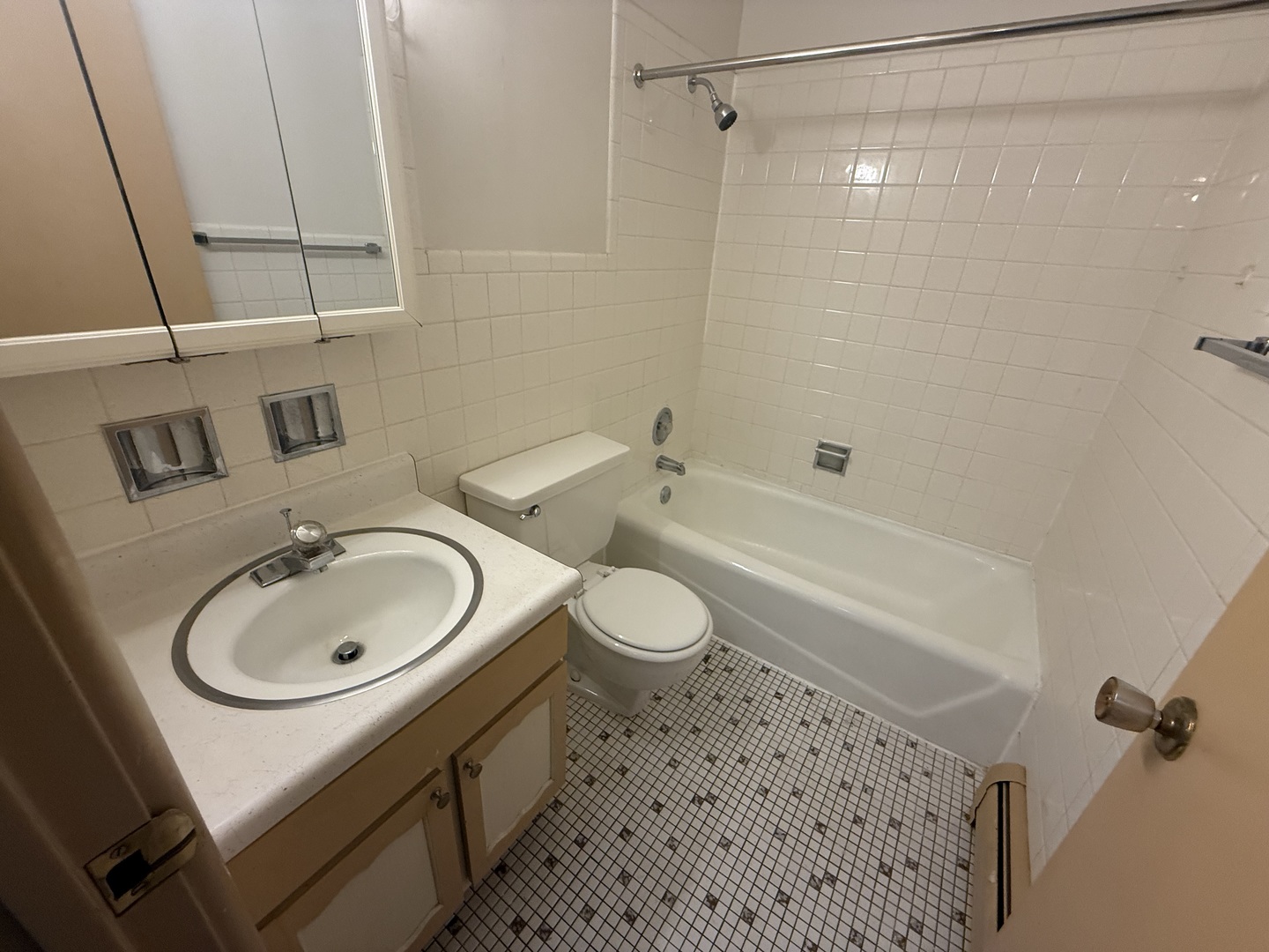 3001 Thatcher Avenue, Unit 2D River Grove, IL 60171 - Photo 11 of 11 a bathroom with a sink a toilet and a bathtub
