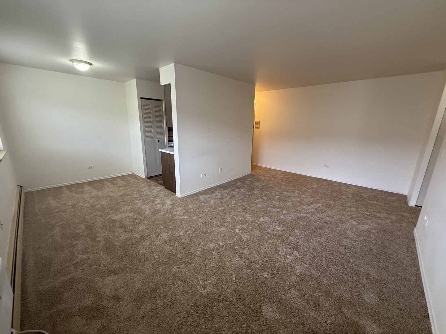 3001 Thatcher Avenue, Unit 2D River Grove, IL 60171 - Photo 4 of 11 a view of an empty room