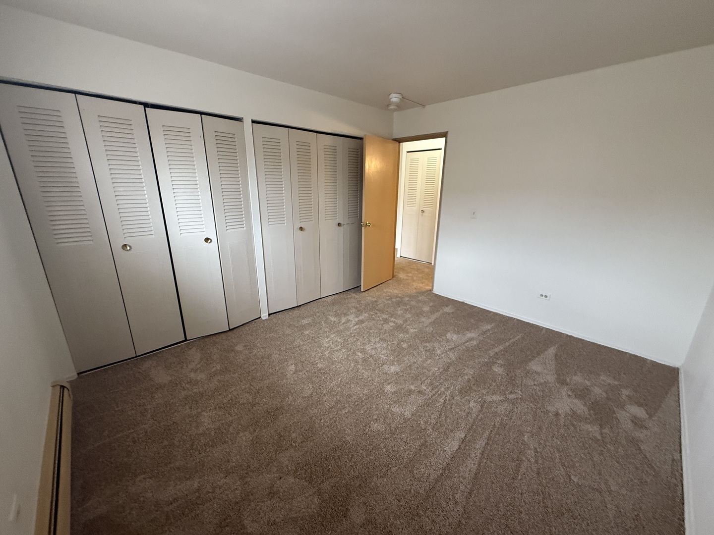 3001 Thatcher Avenue, Unit 2D River Grove, IL 60171 - Photo 8 of 11 a view of an empty room