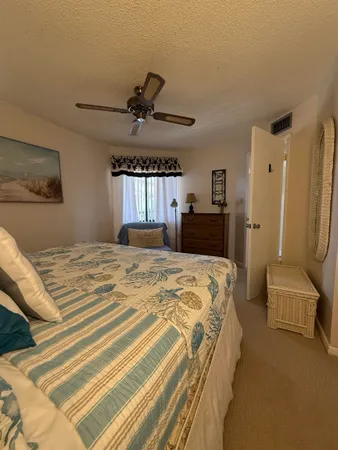 a bedroom with a bed and furniture