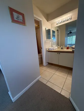 a large room with a kitchen