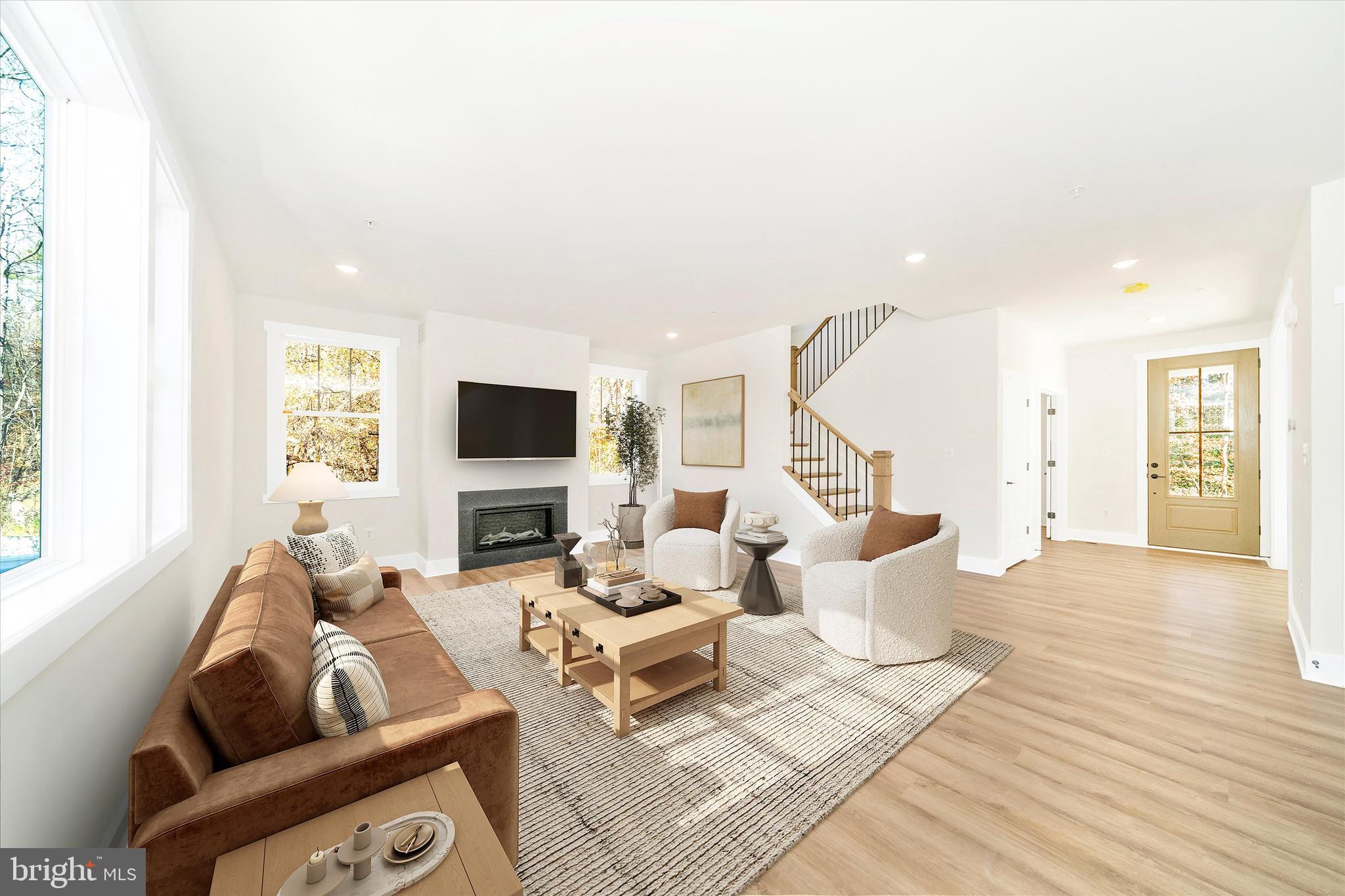 1156 Mt Zion Marlboro Road Lothian, MD 20711 - Photo 12 of 73 a living room with furniture and a flat screen tv