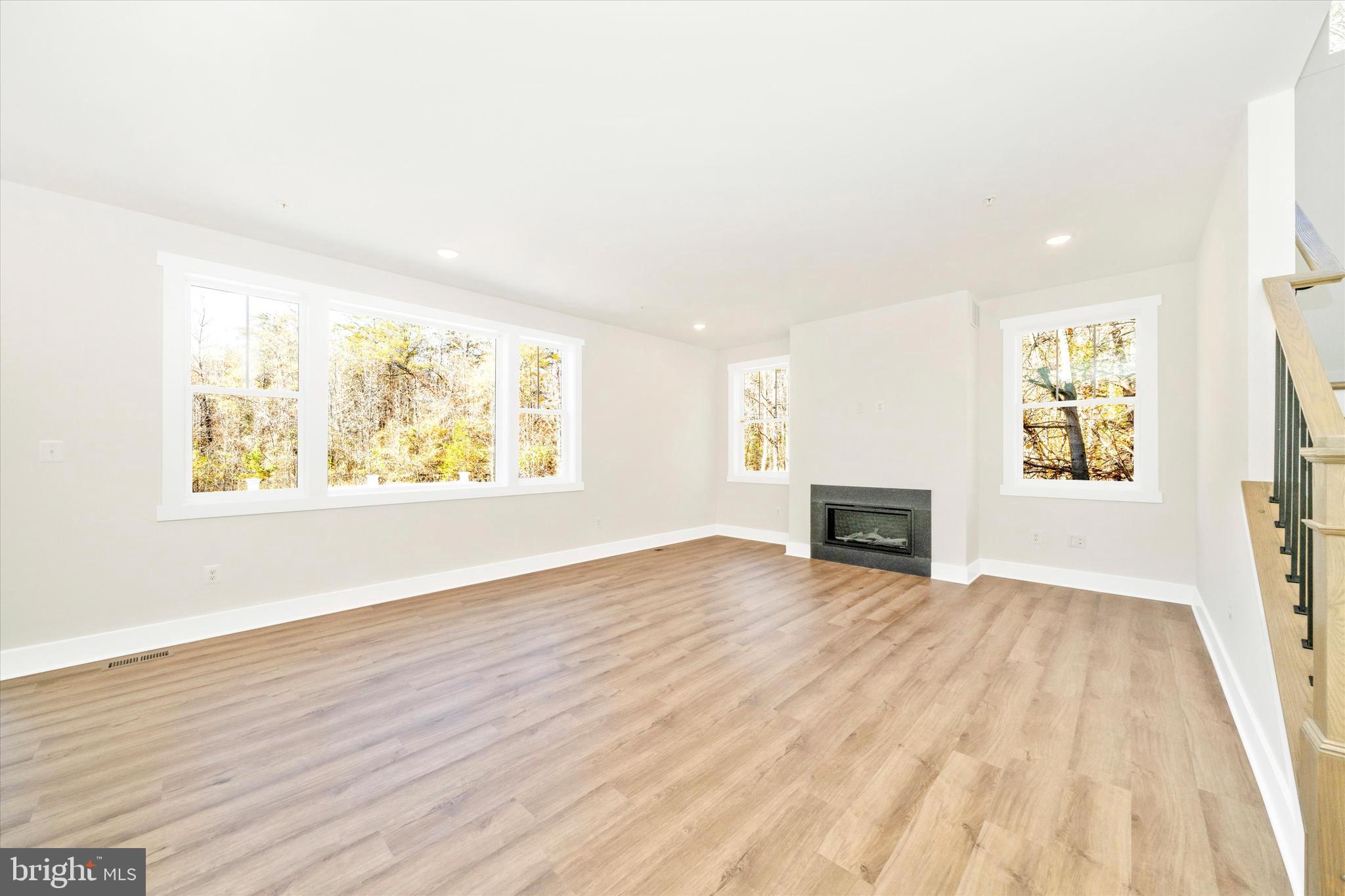 1156 Mt Zion Marlboro Road Lothian, MD 20711 - Photo 13 of 73 wooden floor in an empty room with a window