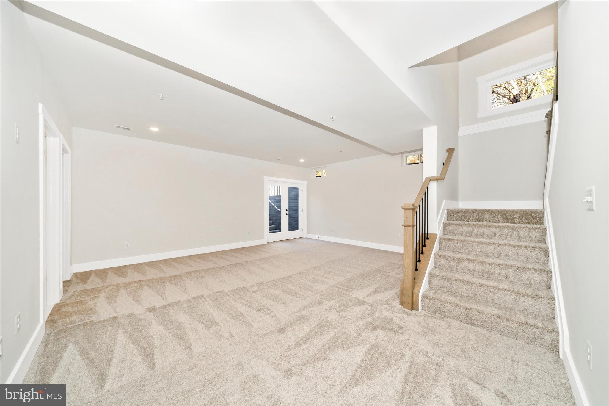 1156 Mt Zion Marlboro Road Lothian, MD 20711 - Photo 43 of 73 a view of a room with stairs and white walls