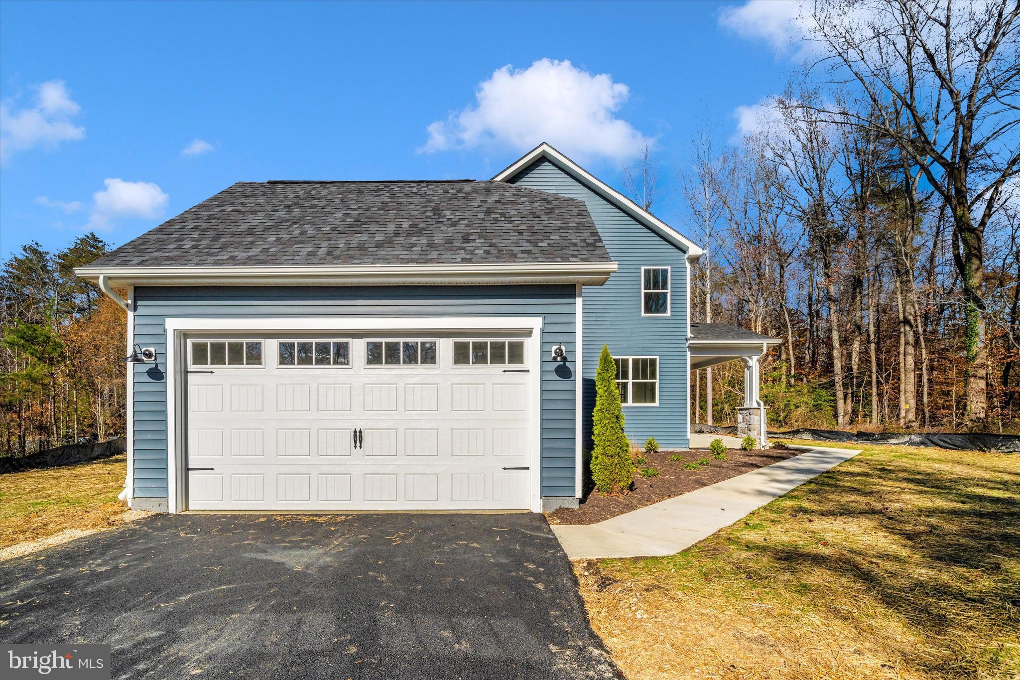 1156 Mt Zion Marlboro Road Lothian, MD 20711 - Photo 64 of 73 a front view of a house with a yard and garage