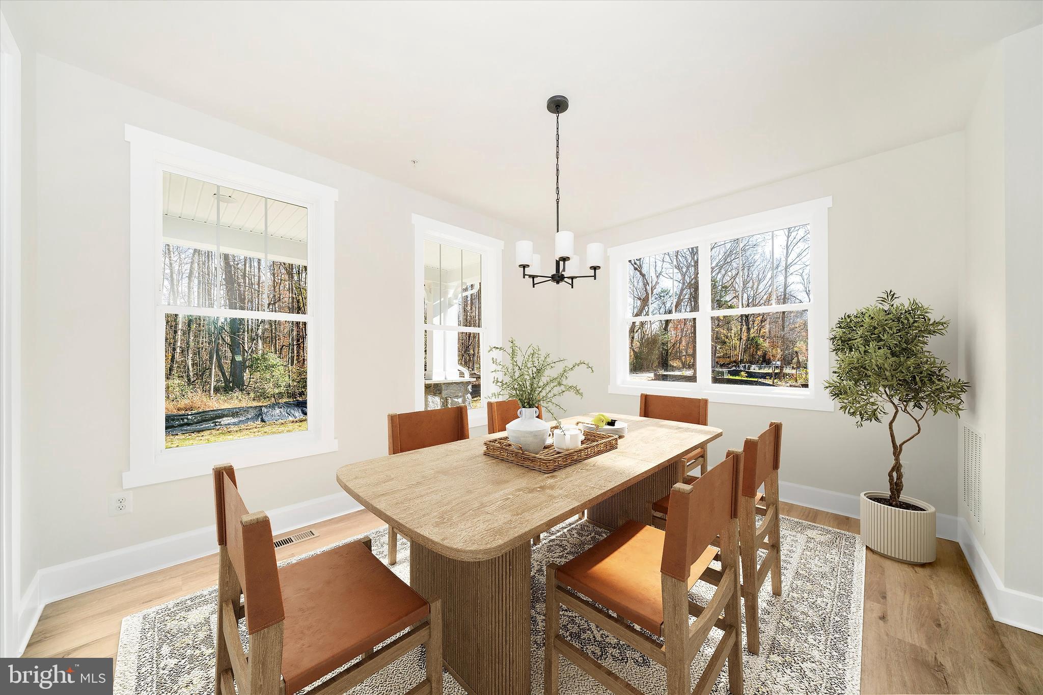 1156 Mt Zion Marlboro Road Lothian, MD 20711 - Photo 7 of 73 a view of a dining room with furniture window and outside view