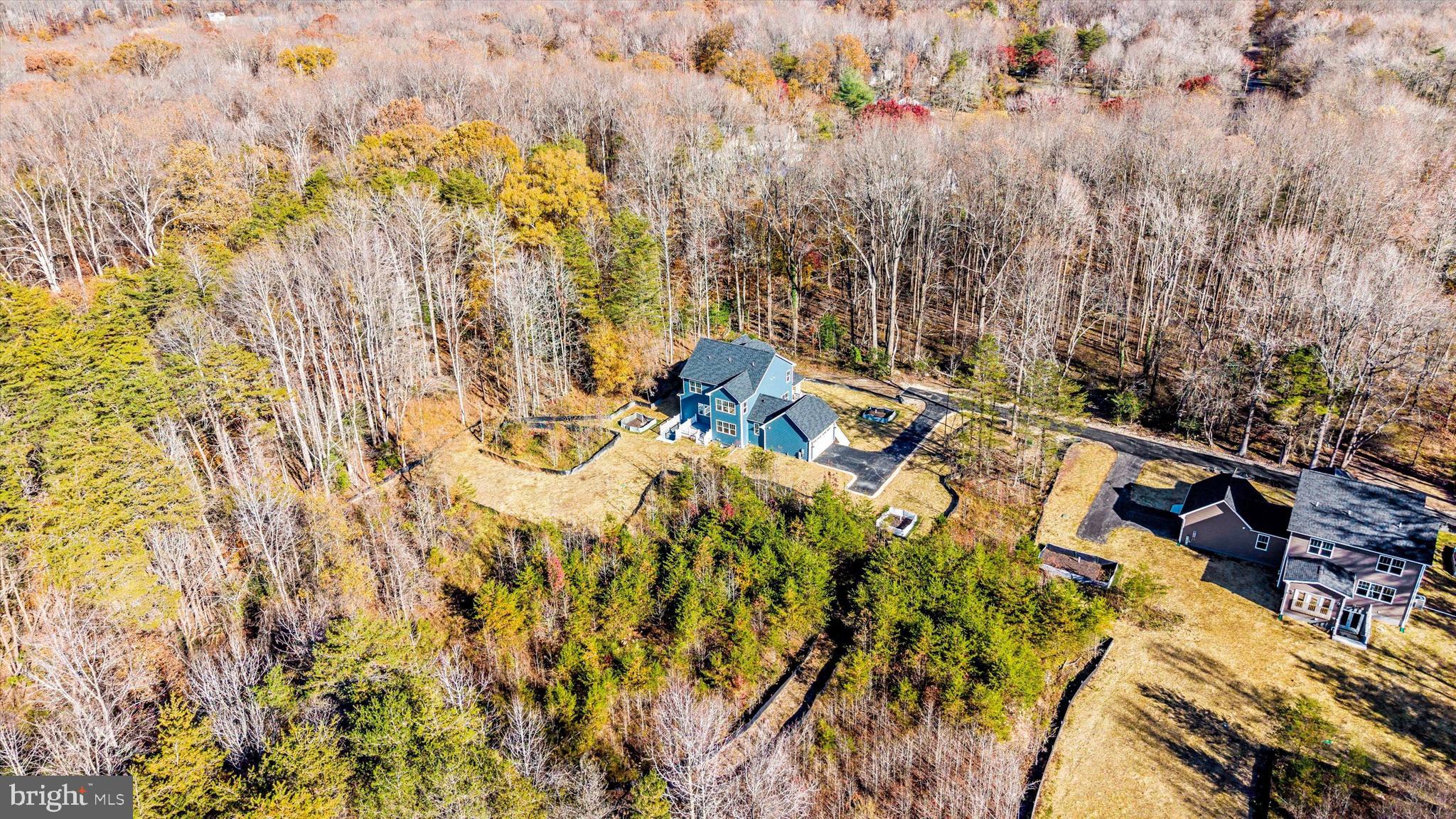 1156 Mt Zion Marlboro Road Lothian, MD 20711 - Photo 73 of 73 a backyard of a house with table and chairs