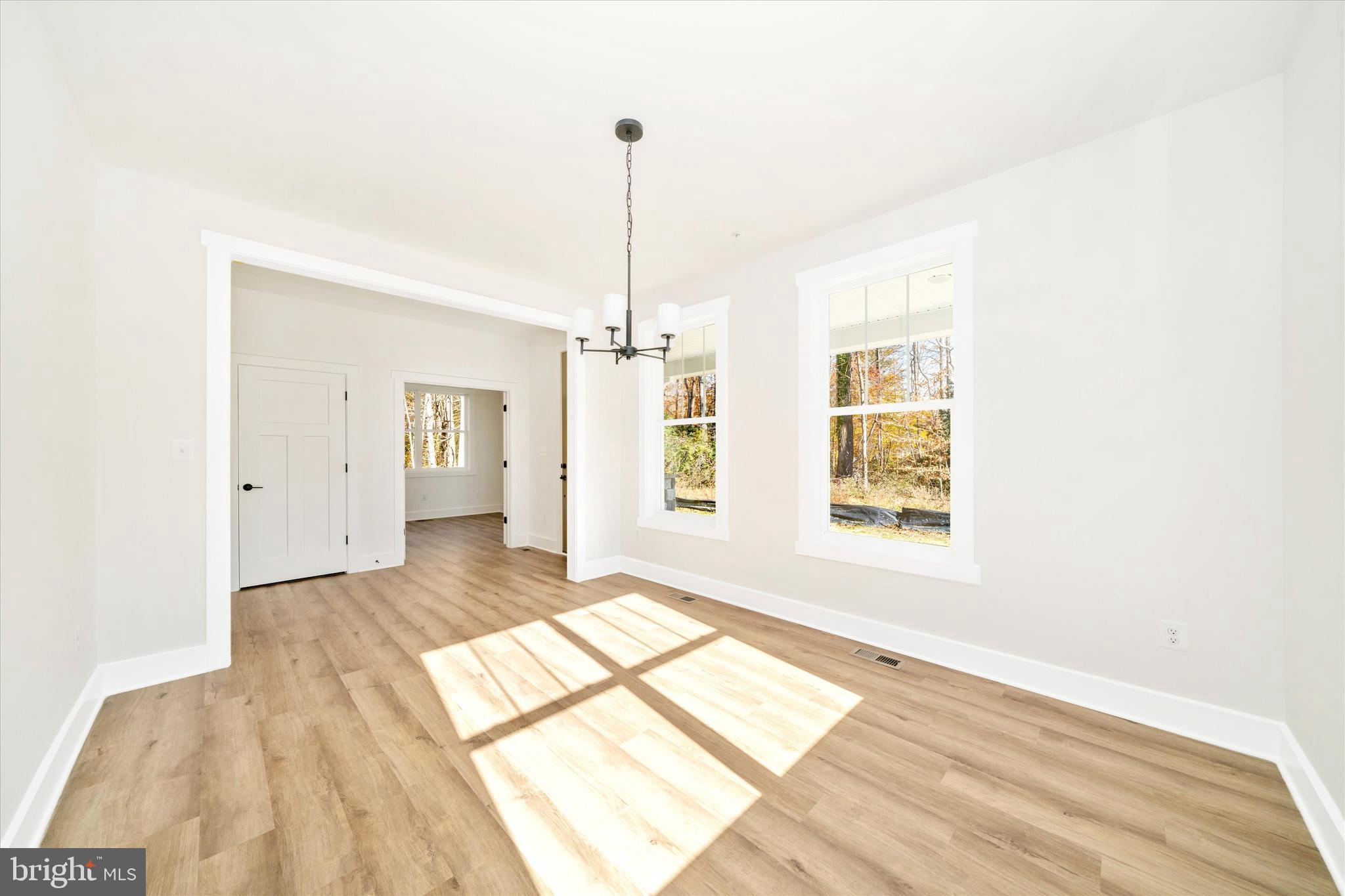 1156 Mt Zion Marlboro Road Lothian, MD 20711 - Photo 10 of 73 a view of an empty room with a window