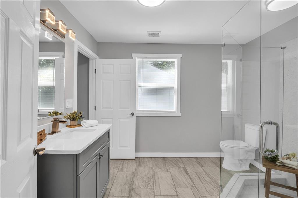 3910 Clairmont Road Atlanta, GA 30341 - Photo 12 of 16 a bathroom with a sink toilet and shower