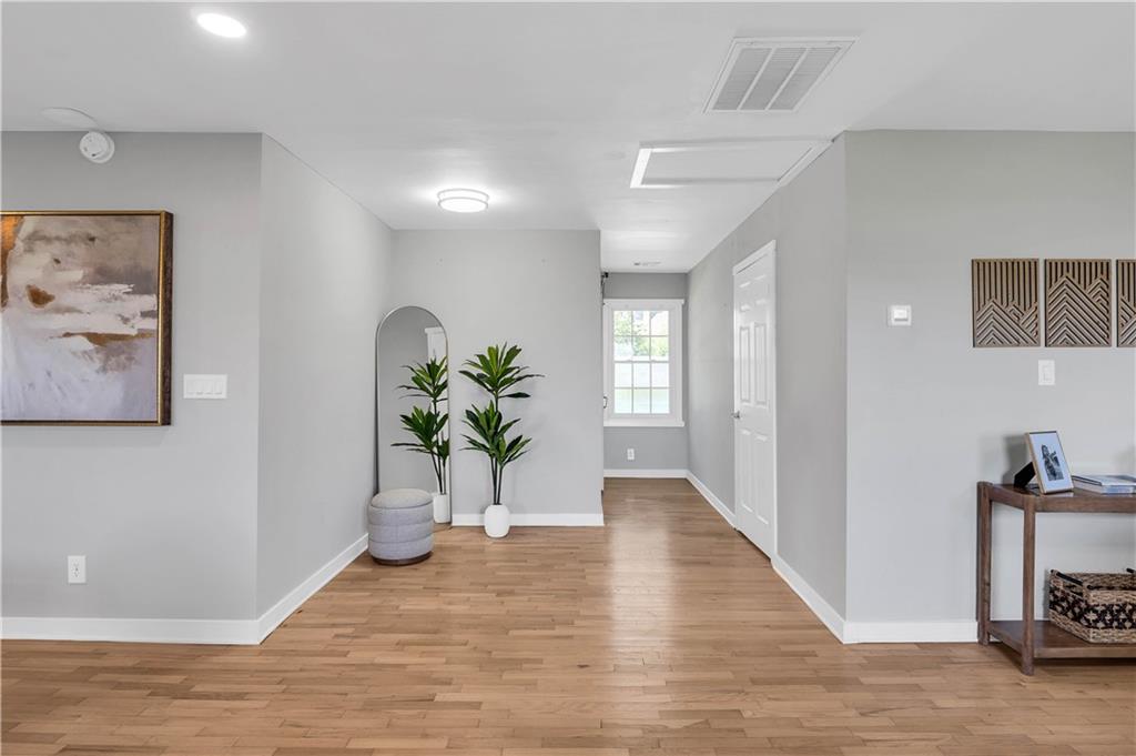 3910 Clairmont Road Atlanta, GA 30341 - Photo 2 of 16 a view of a hallway to a livingroom with furniture