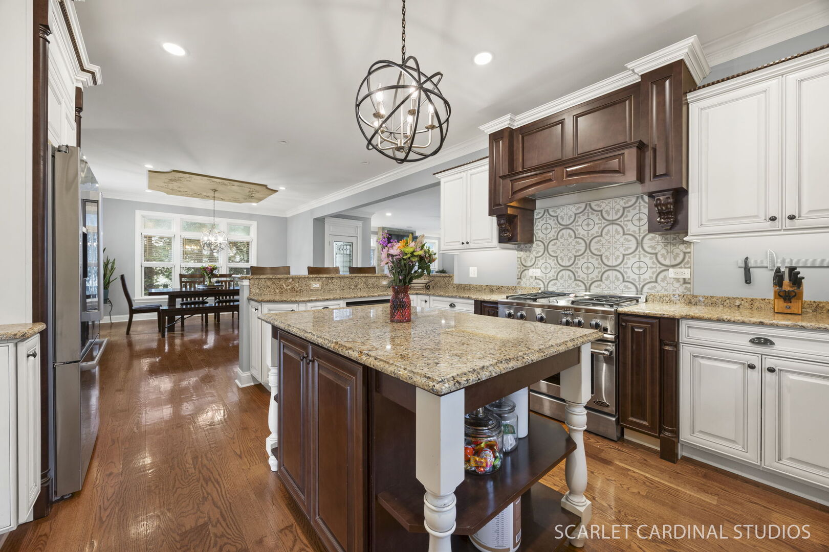 550 Edson Avenue Lombard, IL 60148 - Photo 11 of 32 a kitchen with stainless steel appliances granite countertop a kitchen island a stove and a sink