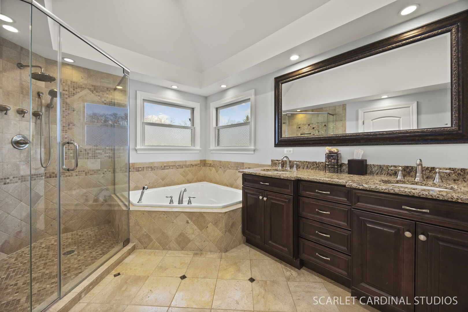 550 Edson Avenue Lombard, IL 60148 - Photo 19 of 32 a bathroom with a granite countertop bathtub sink vanity and mirror