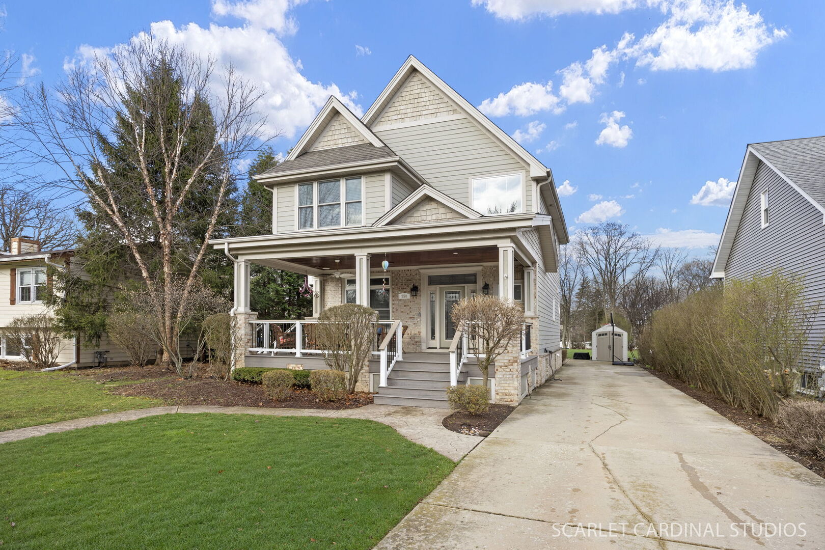 550 Edson Avenue Lombard, IL 60148 - Photo 2 of 32 a front view of a house with a garden
