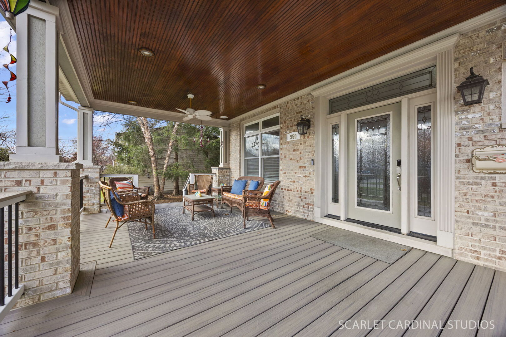 550 Edson Avenue Lombard, IL 60148 - Photo 3 of 32 a view of a patio with table and chairs with wooden floor and floor to ceiling window