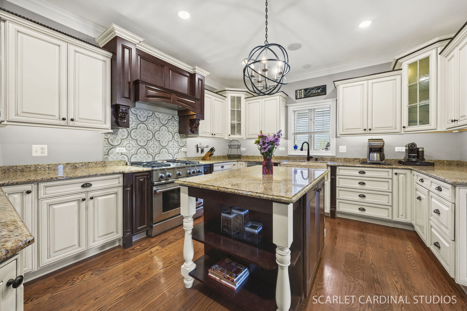550 Edson Avenue Lombard, IL 60148 - Photo 10 of 32 a kitchen with stainless steel appliances granite countertop a sink a stove and cabinets