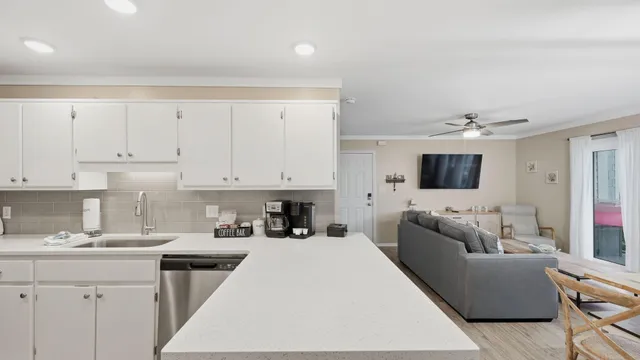 a kitchen with a table and chairs
