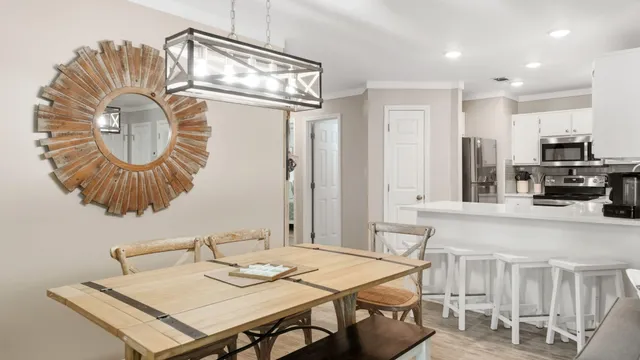 a kitchen with stainless steel appliances a stove and a refrigerator