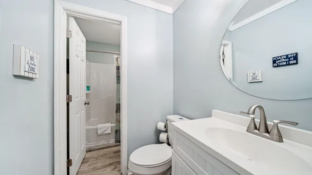 a view of bathroom with a toilet